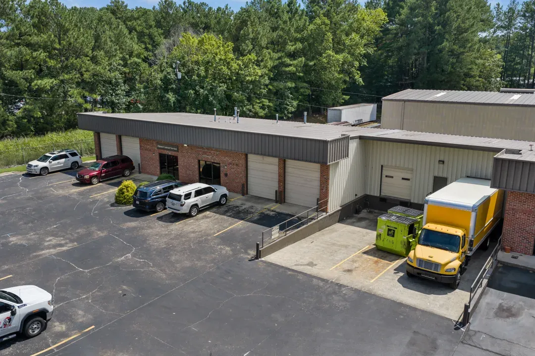 Aerial view of the buildings and parking at 1320 Old Oxford Road in Durham