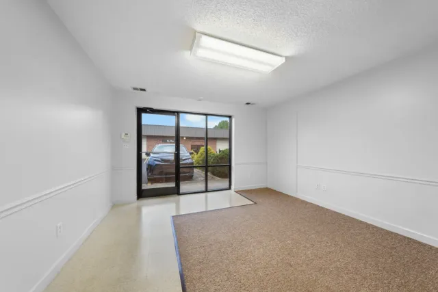 Office entrance and windows at 1320 Old Oxford Road