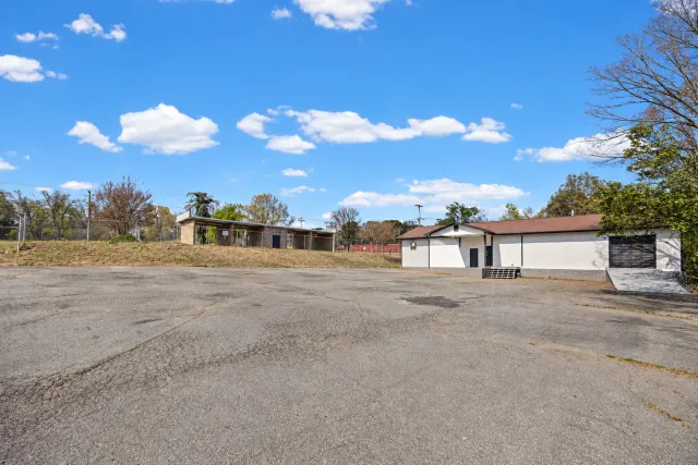Edited front view of the paved yard and Concord warehouse